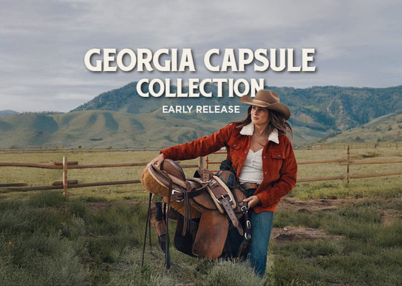 Woman in a cowboy hat and red jacket standing in a field with mountains in the background, promoting the 'Georgia Capsule Collection'.